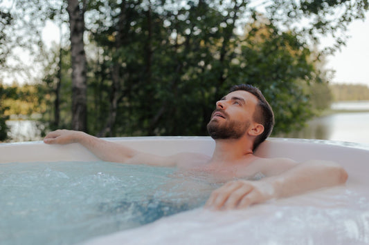 Athlete recovering in a luxury home hot tub for muscle rehabilitation