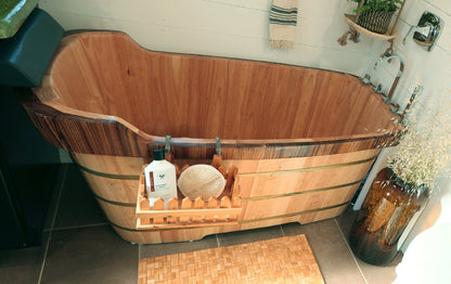 ALFI Brand Wooden Bathtub with bath products in a bathroom setting. - Luxe Tub Source