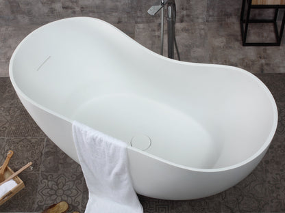 ALFI Brand top angled view of a White freestanding bathtub with a towel draped over it in a bathroom setting. - Luxe Tub Source
