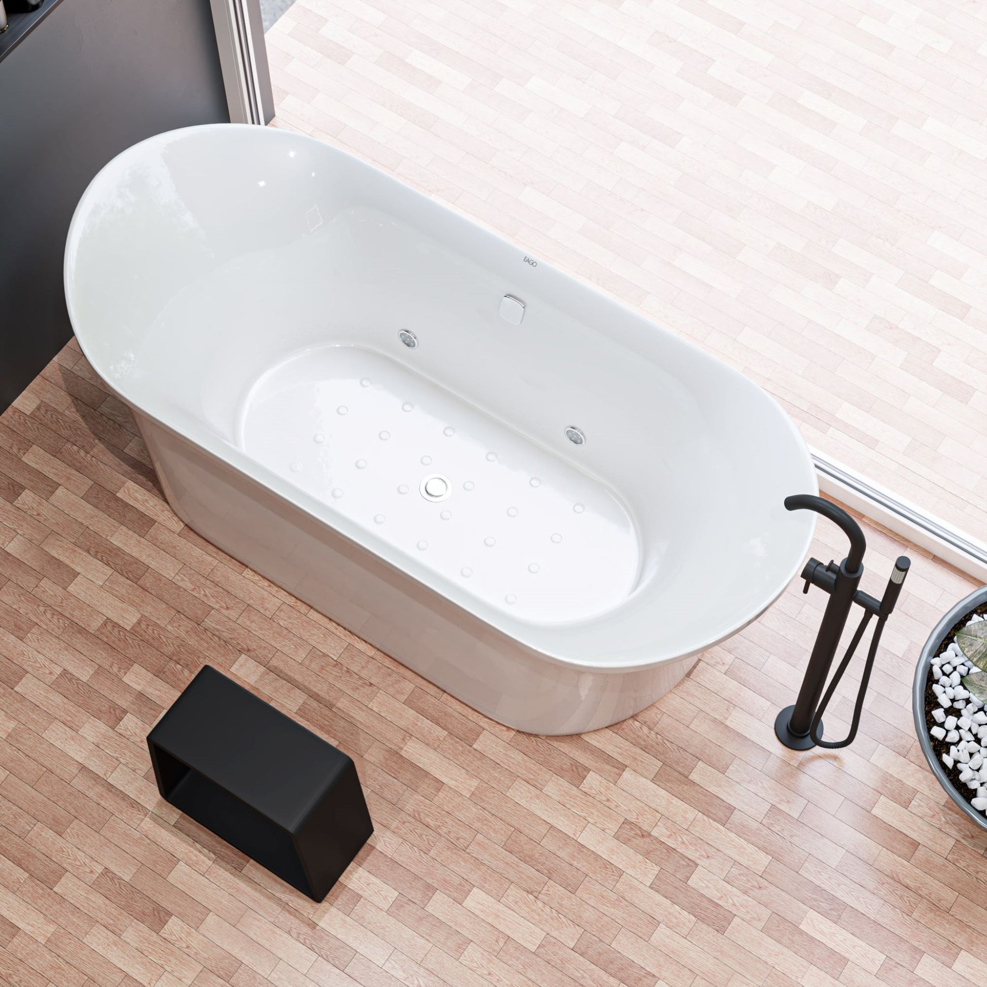 ALFI Brand White freestanding bathtub on a wooden floor with a black bathroom stool. - Luxe Tub Source