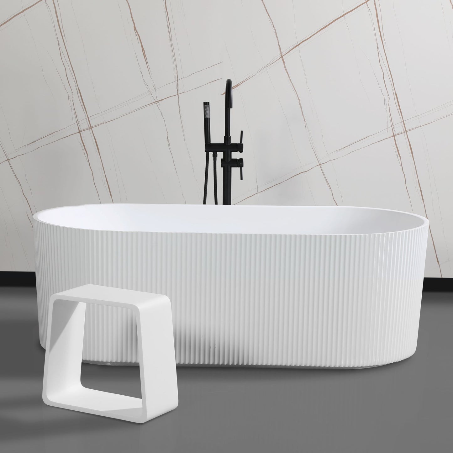 ALFI Brand White freestanding bathtub with a modern design and a bathroom stool in a bathroom setting. - Luxe Tub Source