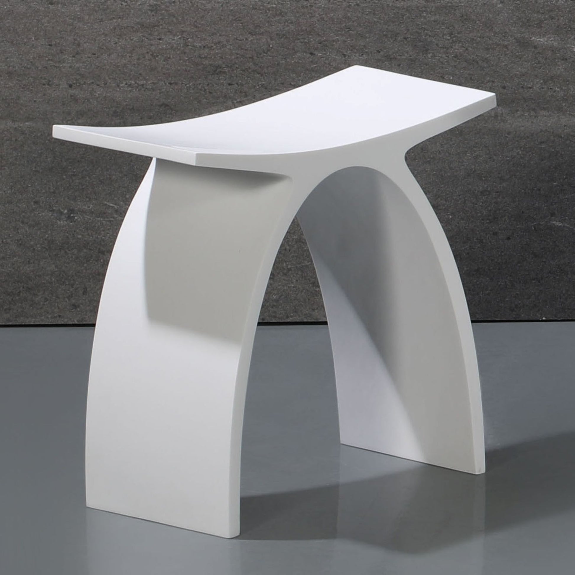 ALFI Brand Modern white stool with a unique design against a gray background. - Luxe Tub Source