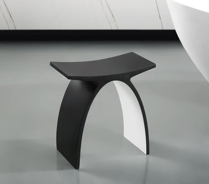ALFI Brand Modern black stool on a reflective surface with a neutral background. - Luxe Tub Source