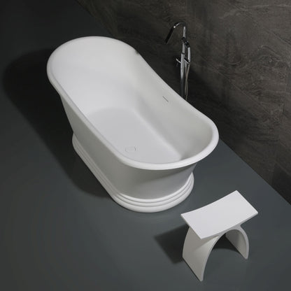 ALFI Brand White freestanding bathtub with a modern faucet and bathroom stool against a dark wall. - Luxe Tub Source