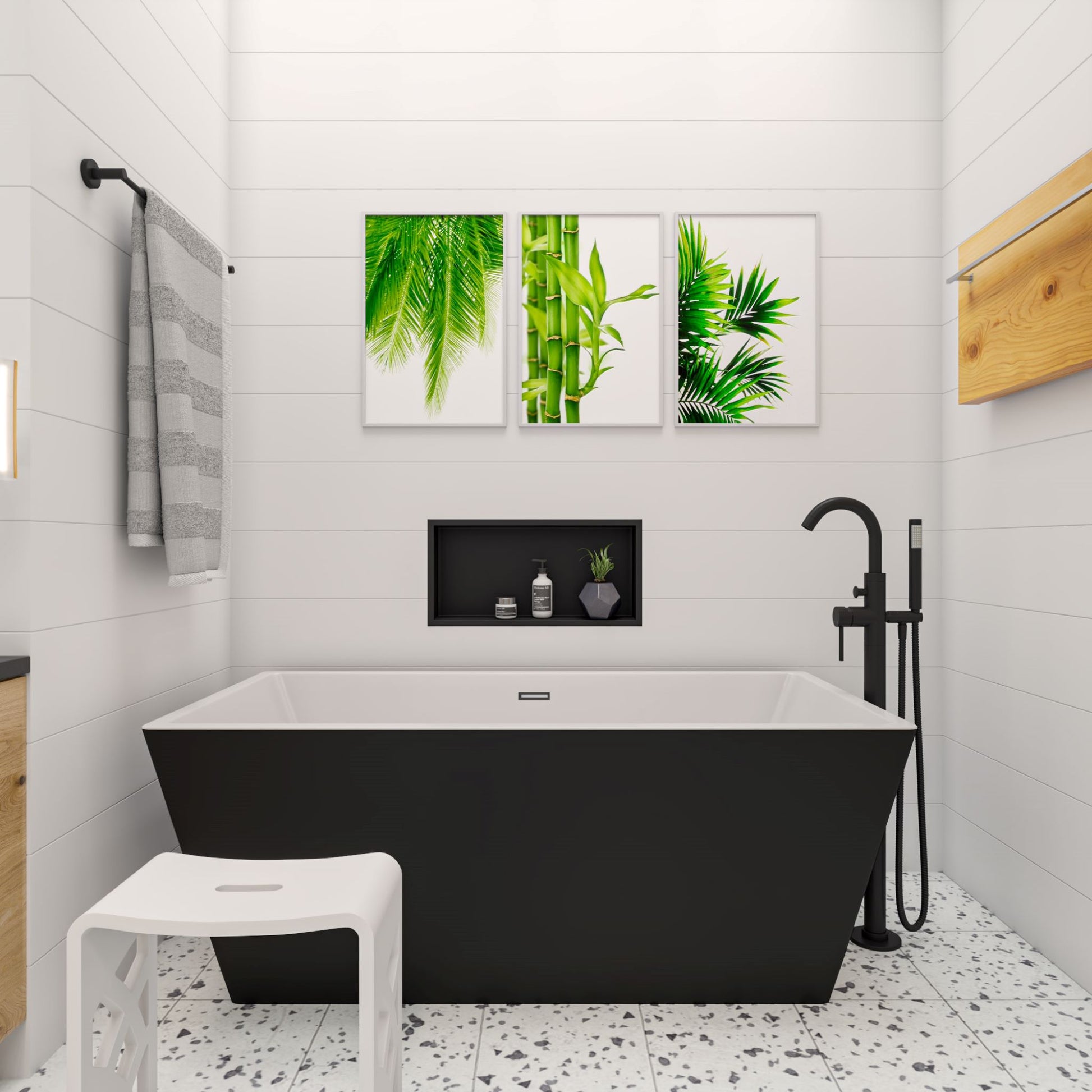 ALFI Brand Modern bathroom with a black freestanding bathtub, white stool, and decorative wall art. - Luxe Tub Source