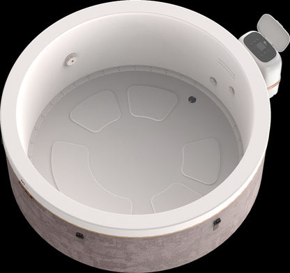 MSpa Round hot tub with white interior and gray exterior on a black background. - Luxe Tub Source