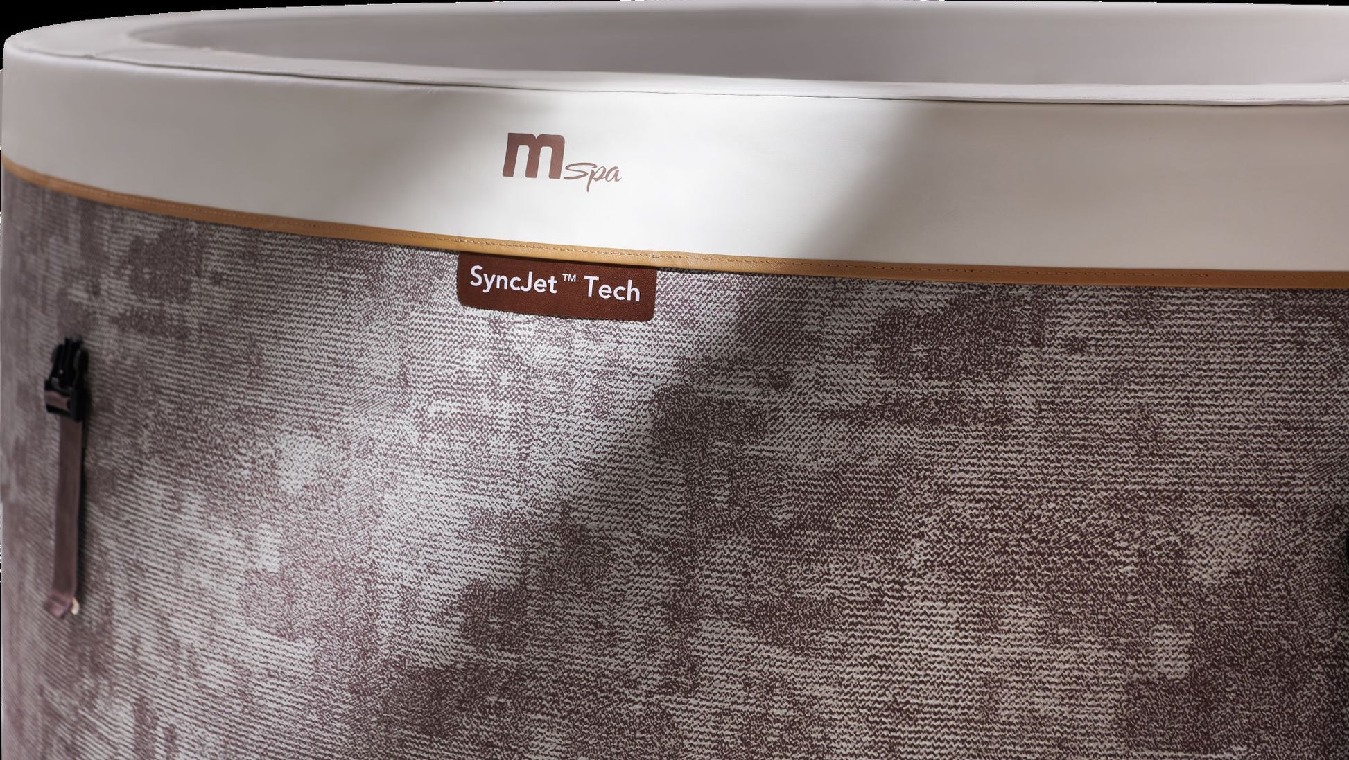 MSpa Close-up of a hot tub with 'Mspa' branding and 'SyncJet Tech' feature. - Luxe Tub Source