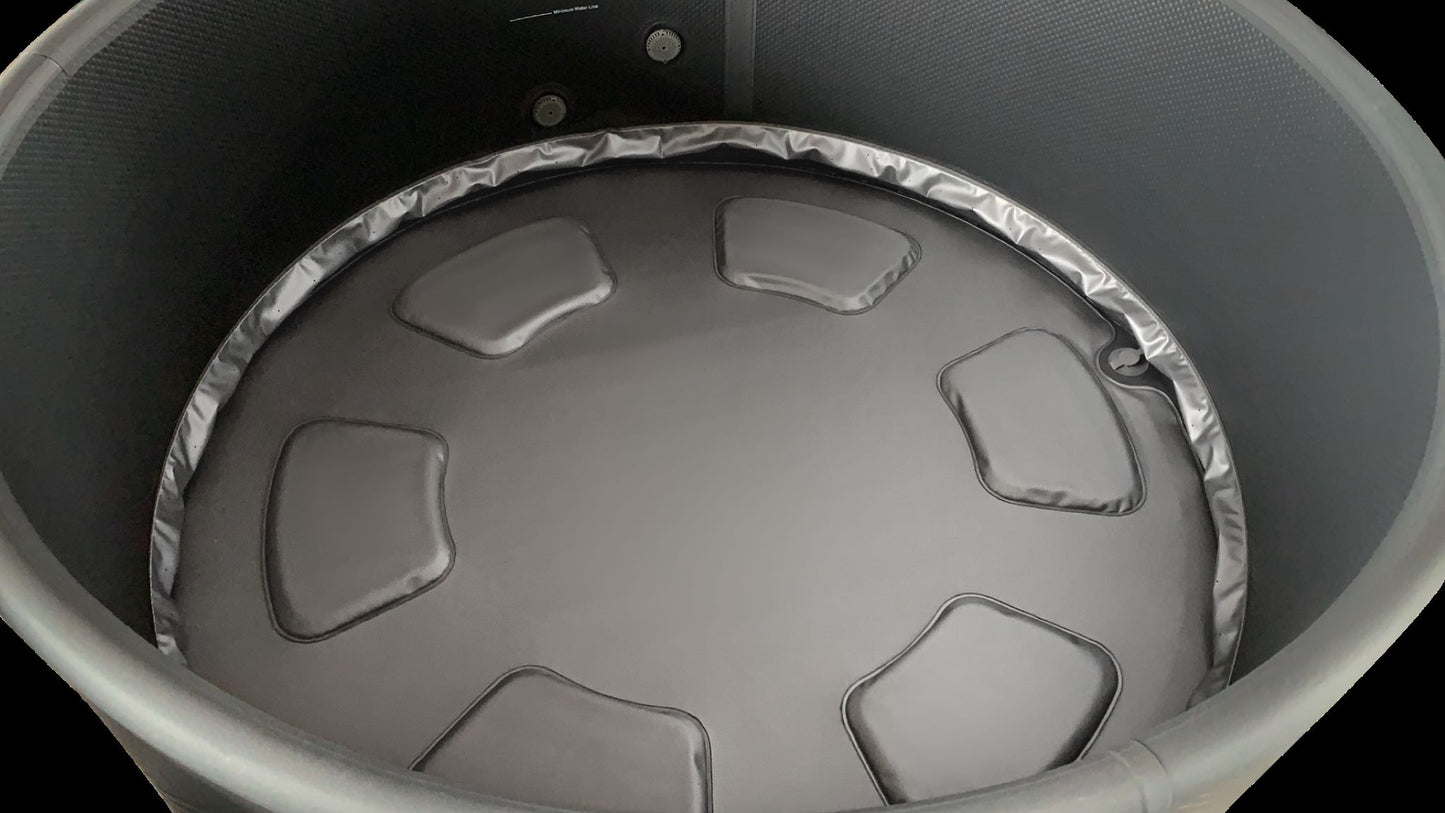 MSpa Close-up of a round hot tub interior. - Luxe Tub Source