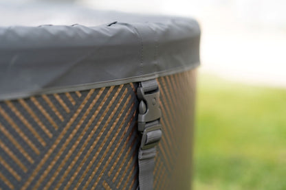 MSpa Close-up of a patterned hot tub with a hot tub cover secured. - Luxe Tub Source