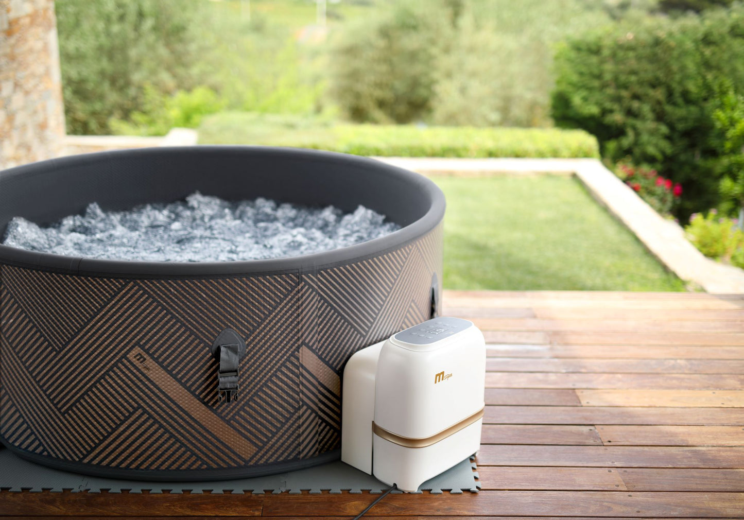 Mspa Hot tub with a white hot tub control unit on a wooden deck outdoors. - Luxe Tub Source