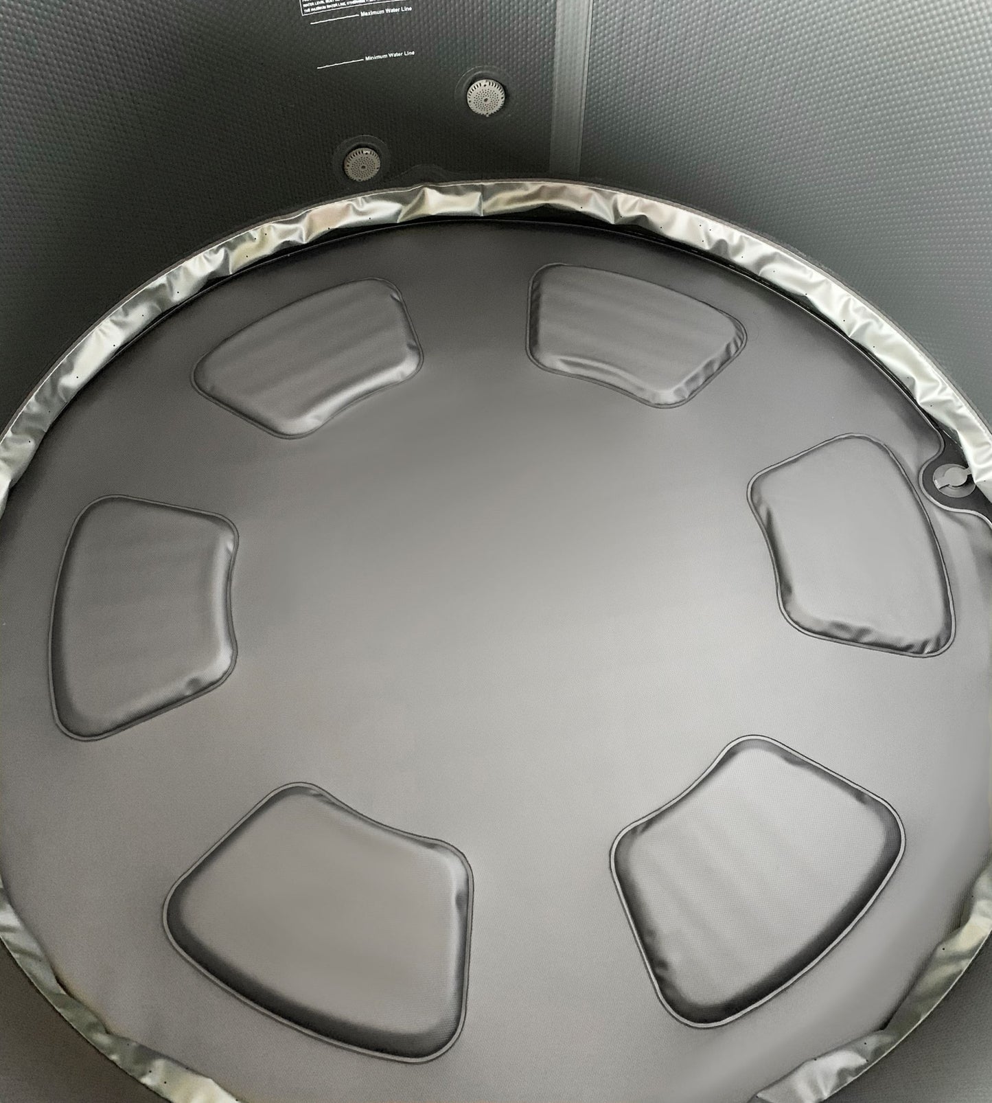 MSpa Top view of a round hot tub with textured interior. - Luxe Tub Source